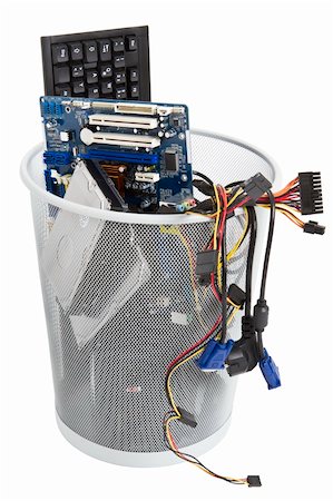 simsearch:400-05738043,k - electronic scrap in trash can. keyboard, power supply, cables, logicboard, hard drive - isolated on white background Stockbilder - Microstock & Abonnement, Bildnummer: 400-06105393
