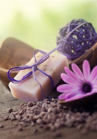 flowers on white stone - Spa and wellness setting with natural soap, candles and towel. Violet dayspa nature set dayspa nature set Stock Photo - Budget Royalty-Free & Subscription, Code: 400-06105407