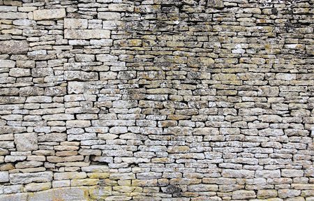 donsimon (artist) - traditional old dry stone wall in cotswolds village of bilbury gloucestershire england Foto de stock - Super Valor sin royalties y Suscripción, Código: 400-06105542