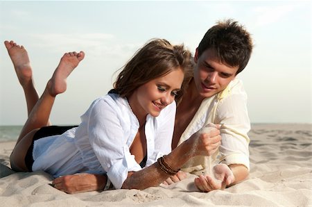 simsearch:400-06360128,k - guy and his girlfriend are on the beach Stock Photo - Budget Royalty-Free & Subscription, Code: 400-06105858