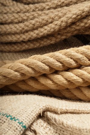 Natural jute rope detail macro shot on a cloth Stock Photo - Budget Royalty-Free & Subscription, Code: 400-06106317