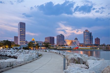 simsearch:400-06143155,k - Image of Milwaukee skyline at twilight with city reflection in lake Michigan and harbor pier. Stock Photo - Budget Royalty-Free & Subscription, Code: 400-06106669