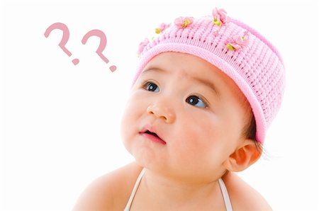 simsearch:400-05739745,k - Wondering pan Asian baby girl with question mark isolated on white background Stock Photo - Budget Royalty-Free & Subscription, Code: 400-06107340