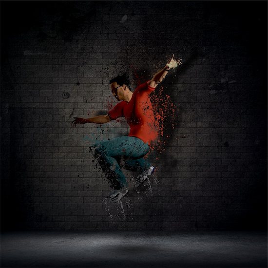 Abstract grunge man dancing against a dark brick wall Stock Photo - Royalty-Free, Artist: kirstypargeter, Image code: 400-06107660