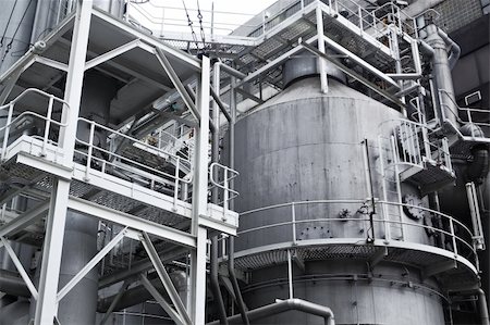 Pipes, tubes, machinery and steam turbine at a power plant Fotografie stock - Microstock e Abbonamento, Codice: 400-06107688