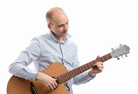 simsearch:400-04921650,k - Guitarist playing acoustic guitar isolated on white Stock Photo - Budget Royalty-Free & Subscription, Code: 400-06108264