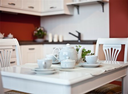 kitchen interior with  dishes  on table  (beautiful Depth Of Field effect) Stock Photo - Budget Royalty-Free & Subscription, Code: 400-06109132
