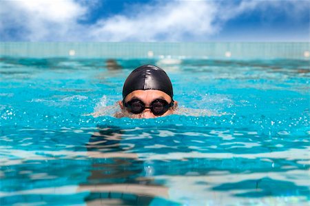 man in the Swimming pool with breast stroke Stock Photo - Budget Royalty-Free & Subscription, Code: 400-06100156