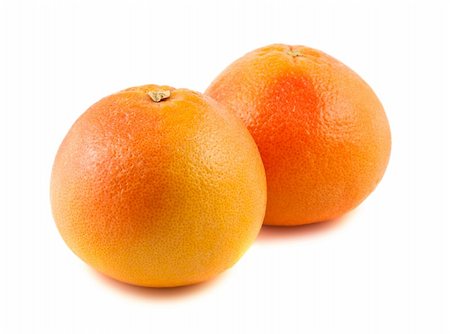 simsearch:400-05316300,k - Two ripe grapefruits isolated on white background Stock Photo - Budget Royalty-Free & Subscription, Code: 400-06100610