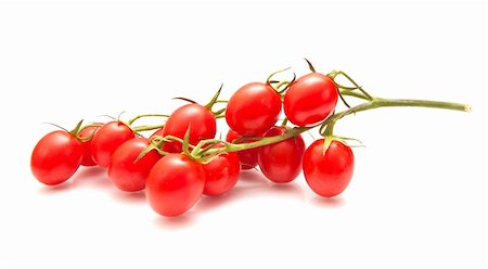 plum tomatoes on the vine on white surface, isolated Foto de stock - Super Valor sin royalties y Suscripción, Código: 400-06101333