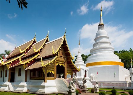 Cathedral and pagoda at Phra Singh Temple, Chiang Mai, Northern Thailand Stock Photo - Budget Royalty-Free & Subscription, Code: 400-06101757