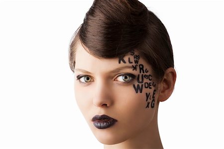simsearch:400-04420197,k - very cute young girl with letter and number painted on her face and a nice creative hair style, she looks in to the lens Foto de stock - Super Valor sin royalties y Suscripción, Código: 400-06101806