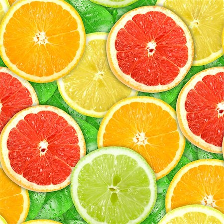 Abstract background with motley citrus-fruit slices and green leaf with dew. Seamless pattern for your design. Close-up. Studio photography. Stock Photo - Budget Royalty-Free & Subscription, Code: 400-06101959