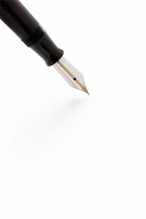 eelnosiva (artist) - a vintage fountain pen with the nib touching white paper Foto de stock - Royalty-Free Super Valor e Assinatura, Número: 400-06102225