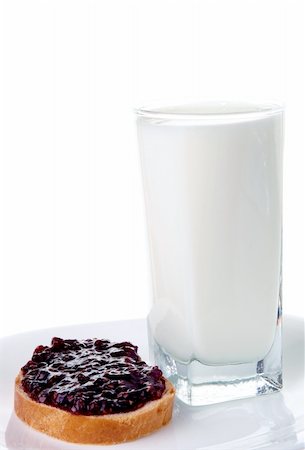 glass of milk and white loaf with raspberry jam Stock Photo - Budget Royalty-Free & Subscription, Code: 400-06102308