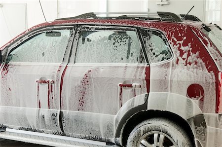 detergente - automobile service station on the foam-covered, washing machine Foto de stock - Super Valor sin royalties y Suscripción, Código: 400-06102486