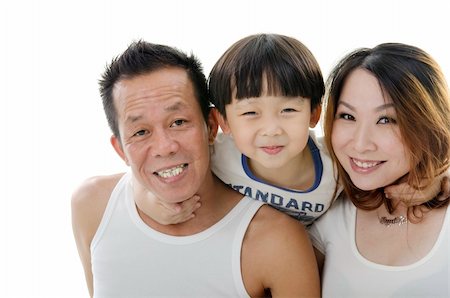 simsearch:400-04633809,k - Close up Asian family on white background Photographie de stock - Aubaine LD & Abonnement, Code: 400-06103373