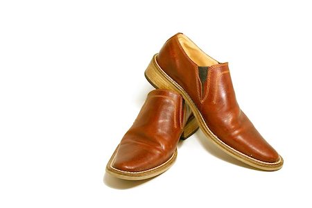 Isolated picture of a pair of Brown Shoes Stock Photo - Budget Royalty-Free & Subscription, Code: 400-06126479