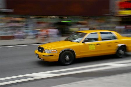 Panned Blur of a New York Taxi in Time Square Stock Photo - Budget Royalty-Free & Subscription, Code: 400-06126932