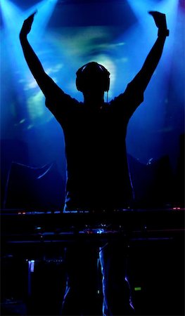 dj crowd - An icelandic Dj, i kinda like the simetry in the siluette Stock Photo - Budget Royalty-Free & Subscription, Code: 400-06127377