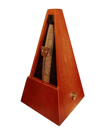 A brown metronome used for keeping cadences Stock Photo - Budget Royalty-Free & Subscription, Code: 400-06127507