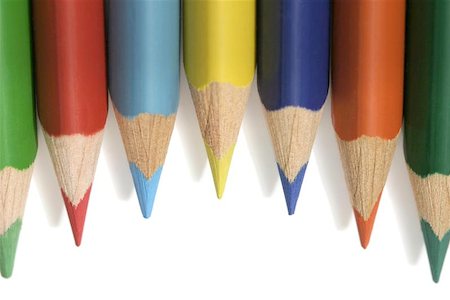 coloured pencils with pointed tips on a white background casting soft shadows Photographie de stock - Aubaine LD & Abonnement, Code: 400-06128130