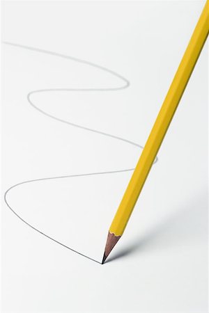 pencil moving on a white surface and drawing a line Photographie de stock - Aubaine LD & Abonnement, Code: 400-06128131