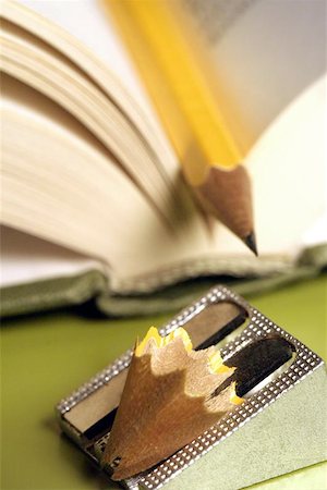 pencil in a book with sharpener Photographie de stock - Aubaine LD & Abonnement, Code: 400-06128142