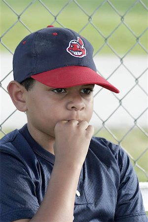 Minority (African American) boy playing Little League Baseball Photographie de stock - Aubaine LD & Abonnement, Code: 400-06128201