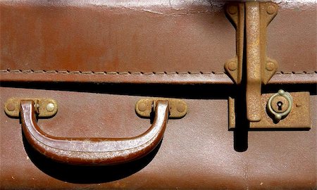 Old leather suitcase with handle and lock, severn valley railway, bewdley station, uk Stock Photo - Budget Royalty-Free & Subscription, Code: 400-06129315