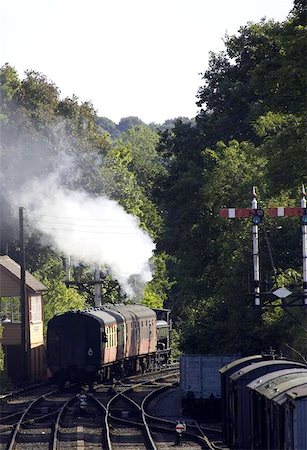 simsearch:862-03288971,k - Steam train pulling carriages away from station, severn valley railway, bewdley, uk Stock Photo - Budget Royalty-Free & Subscription, Code: 400-06129312