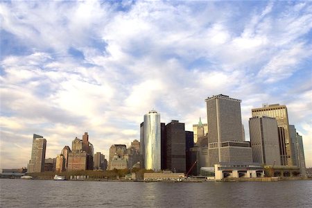 view of downtown manhattan at dusk from the Staten island ferry, Statten island ferry terminal is at the bottom right, new york, America, usa Stock Photo - Budget Royalty-Free & Subscription, Code: 400-06129354