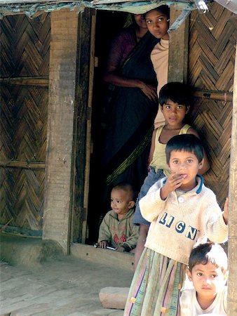 simsearch:841-02947142,k - A curious family near a sea side village of Bangladesh. Stock Photo - Budget Royalty-Free & Subscription, Code: 400-06129578