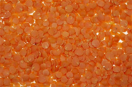 simsearch:400-05672477,k - Red split lentils Photographie de stock - Aubaine LD & Abonnement, Code: 400-06129845