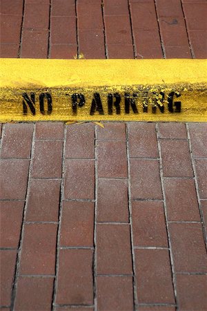 No parking sign on kerb in celebration florida united states usa Foto de stock - Super Valor sin royalties y Suscripción, Código: 400-06129993