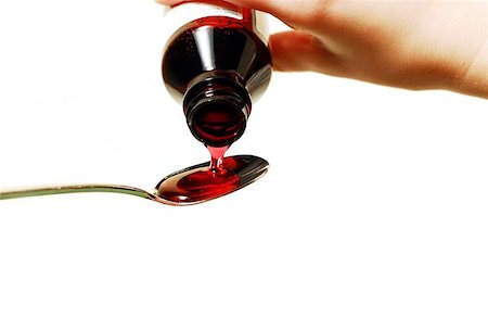 simsearch:400-05092596,k - Cough syrup poured into a spoon Stock Photo - Budget Royalty-Free & Subscription, Code: 400-06134013