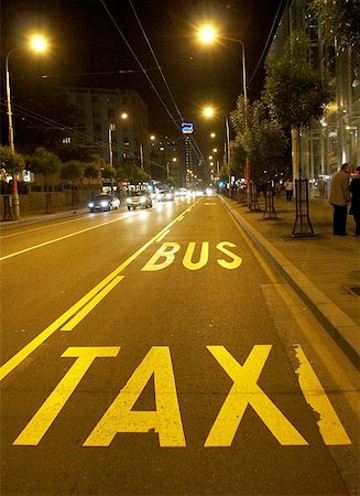 public bus at night - taxi and bus lane  A grainy image shot at high ISO Stock Photo - Budget Royalty-Free & Subscription, Code: 400-06134309