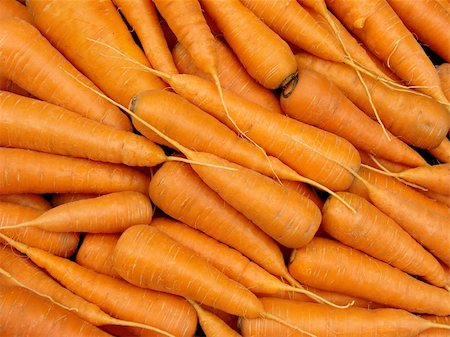 simsearch:400-04351737,k - some fresh cropped carrots as background Stock Photo - Budget Royalty-Free & Subscription, Code: 400-06135385