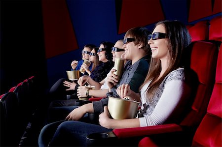 People watch a movie in 3D glasses in the cinema Stock Photo - Budget Royalty-Free & Subscription, Code: 400-06135474