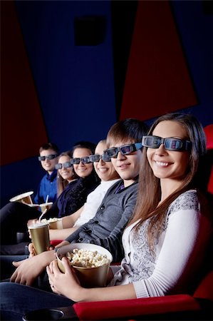Happy people in 3D glasses at the cinema Stock Photo - Budget Royalty-Free & Subscription, Code: 400-06135475