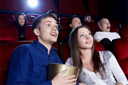 Surprised people in the cinema Stock Photo - Budget Royalty-Free & Subscription, Code: 400-06135478