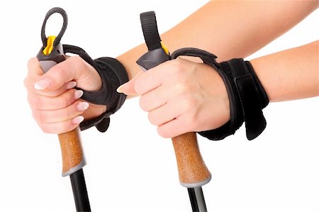 stick people holding hands - A close-up of female hands holding nordic walking sticks over white background Stock Photo - Budget Royalty-Free & Subscription, Code: 400-06135546