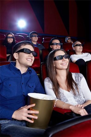 People watch a movie in 3D glasses in the cinema Stock Photo - Budget Royalty-Free & Subscription, Code: 400-06135630