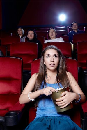 Surprised girl at the cinema Stock Photo - Budget Royalty-Free & Subscription, Code: 400-06135718
