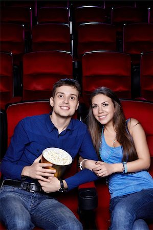 A couple in a movie theater Stock Photo - Budget Royalty-Free & Subscription, Code: 400-06135724