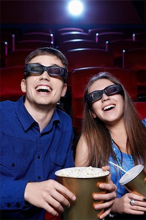 Young couple in a movie theater Stock Photo - Budget Royalty-Free & Subscription, Code: 400-06135725