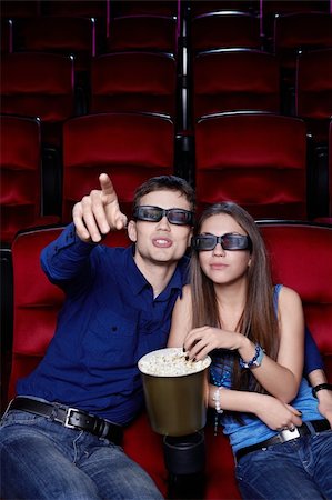 Young couple in a movie theater Stock Photo - Budget Royalty-Free & Subscription, Code: 400-06135726