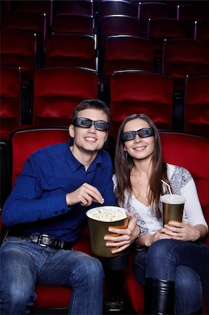 Happy couple at the cinema Stock Photo - Budget Royalty-Free & Subscription, Code: 400-06135933