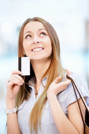 simsearch:400-04107785,k - Beautiful girl with credit card at the store Fotografie stock - Microstock e Abbonamento, Codice: 400-06135985