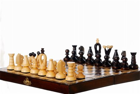 simsearch:625-01744806,k - Setup chess board at an angle. Focus on white castle. Photographie de stock - Aubaine LD & Abonnement, Code: 400-06137649